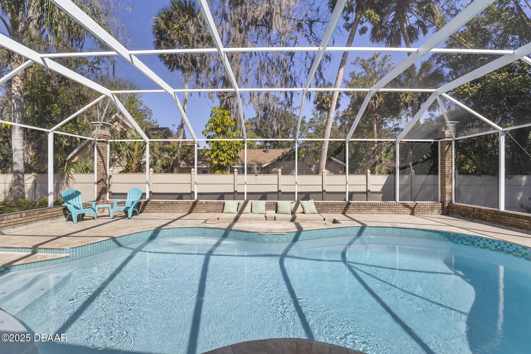 13 Fernery Trail Ormond Beach, FL 32174 - Photo 46 of 57 a view of outdoor space with swimming pool