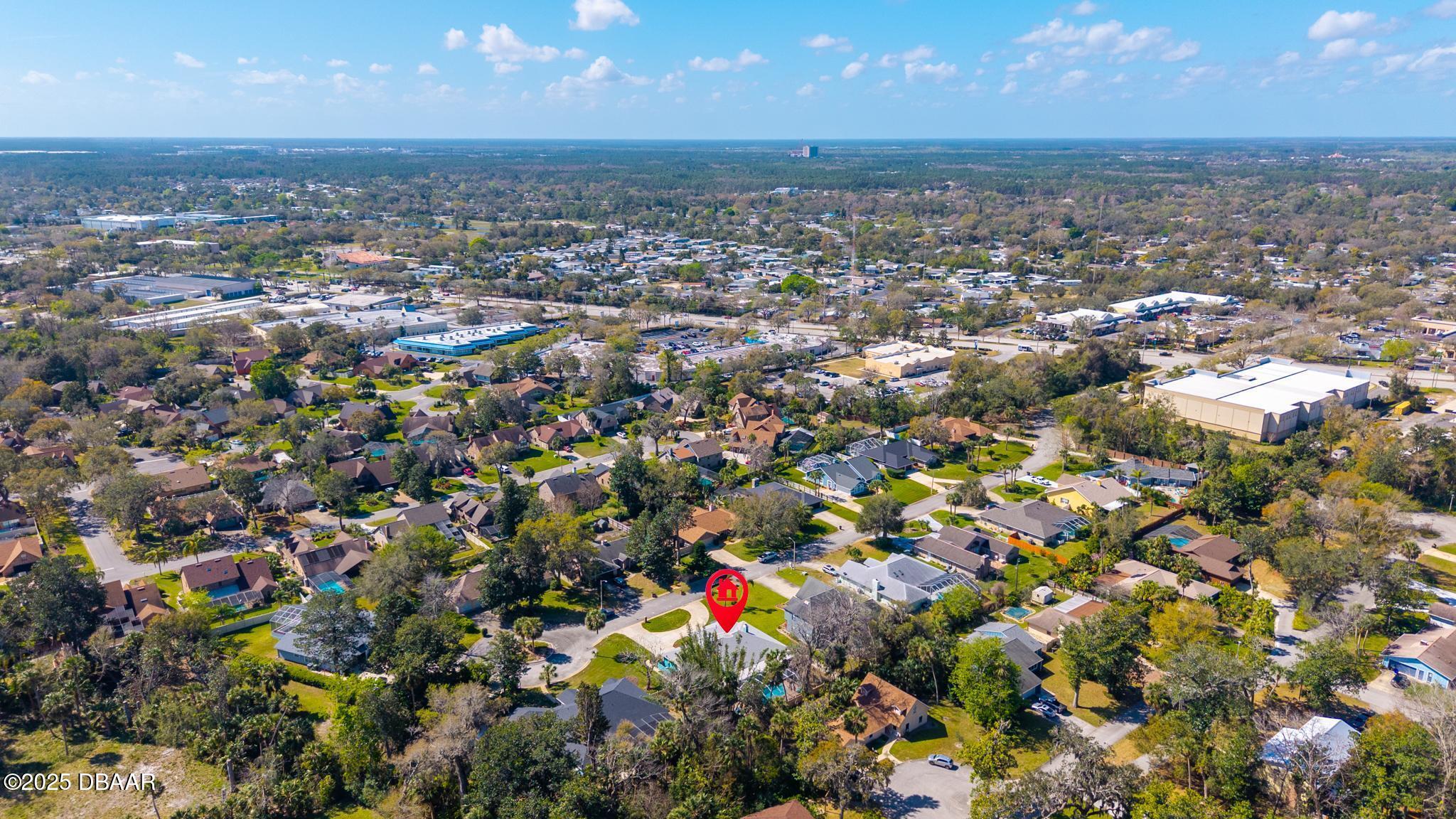 13 Fernery Trail Ormond Beach, FL 32174 - Photo 55 of 57 an aerial view of residential houses with outdoor space and trees