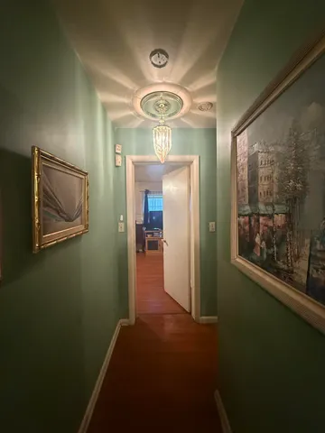 a bedroom with a bed and a view of bathroom