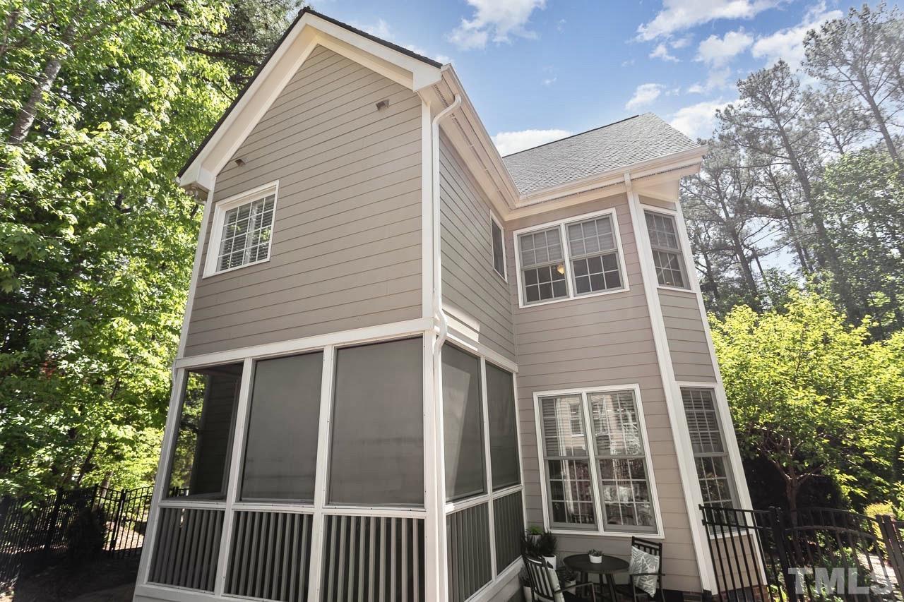 8333 Wheatstone Lane Raleigh, NC 27613 - Photo 29 of 34 a view of a house with a yard and balcony