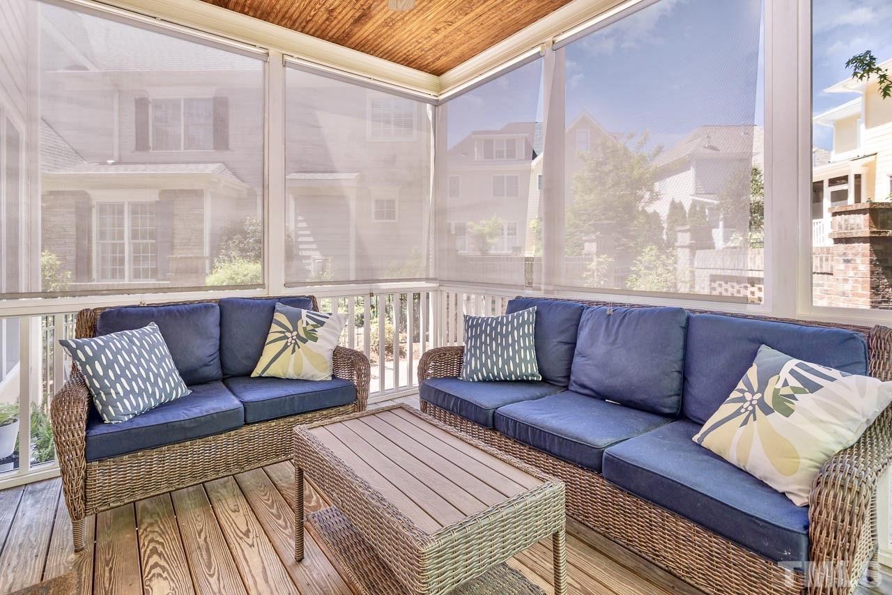 8333 Wheatstone Lane Raleigh, NC 27613 - Photo 30 of 34 a living room with furniture and a large window