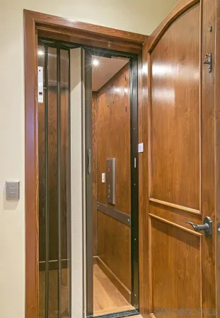 a view of a patio with table and chairs and potted plants