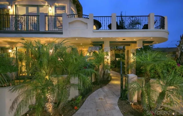 a view of a backyard of the house