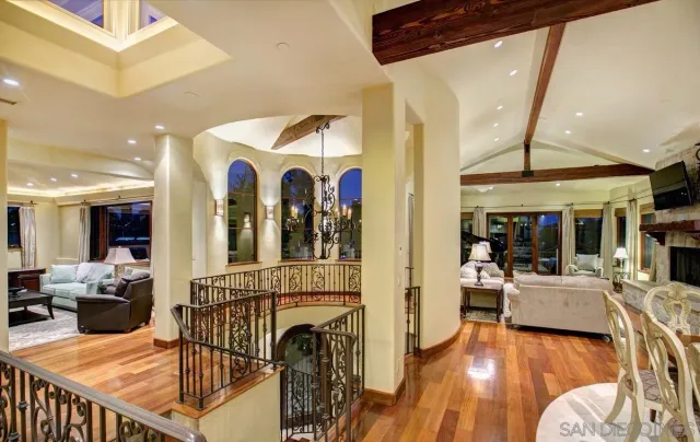 a view of a living room and dining room