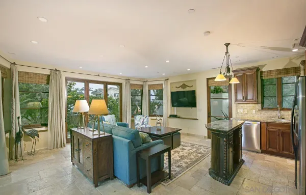 a room with lots of table and chairs