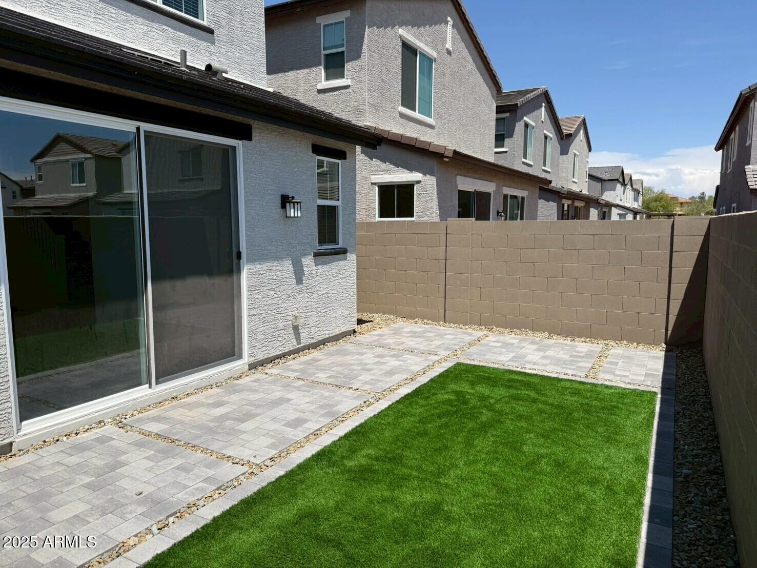 2443 West Rowel Road Phoenix, AZ 85085 - Photo 18 of 19 a front view of a house with a yard