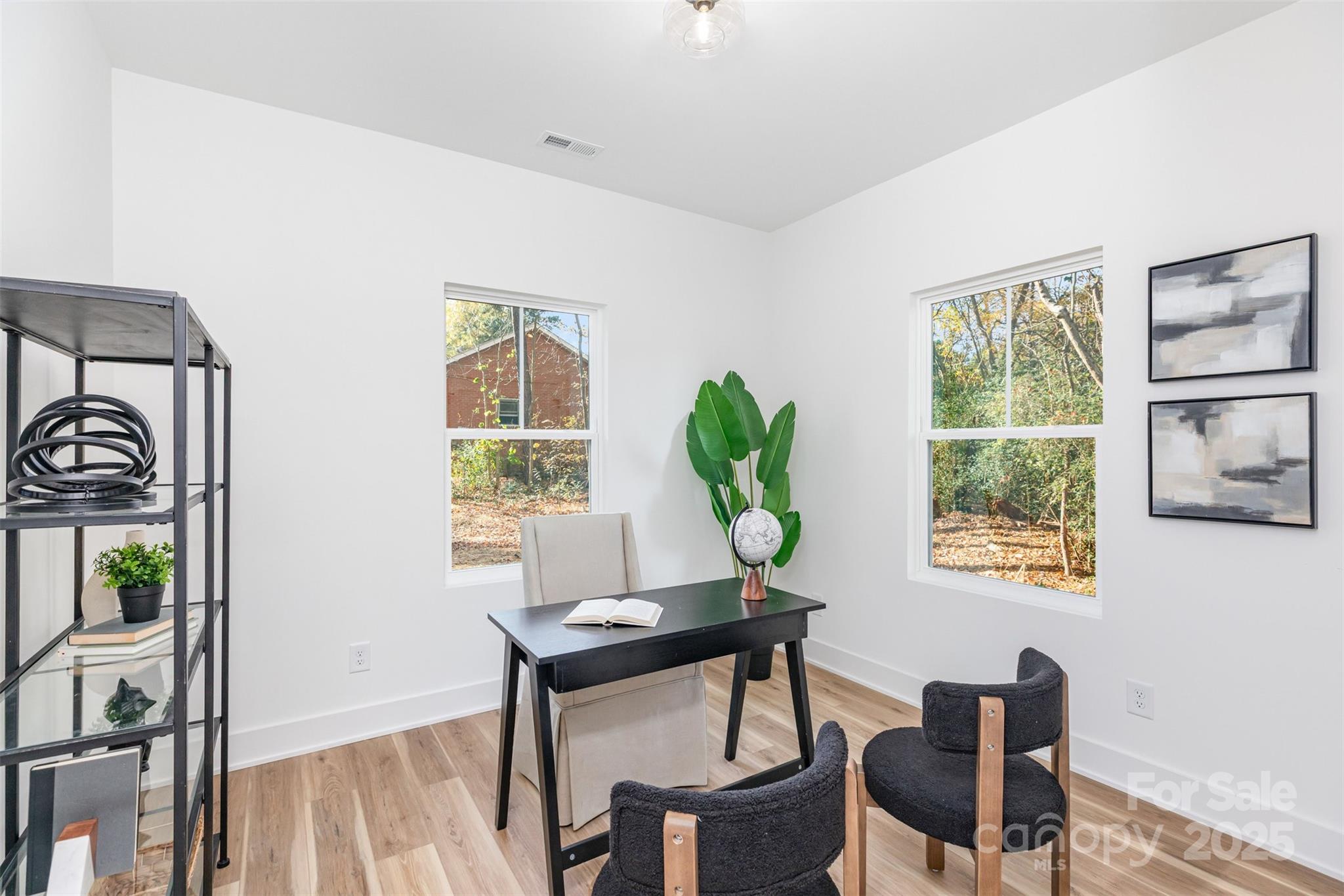 2802 Walkup Avenue Monroe, NC 28110 - Photo 6 of 16 a workspace with furniture and a window