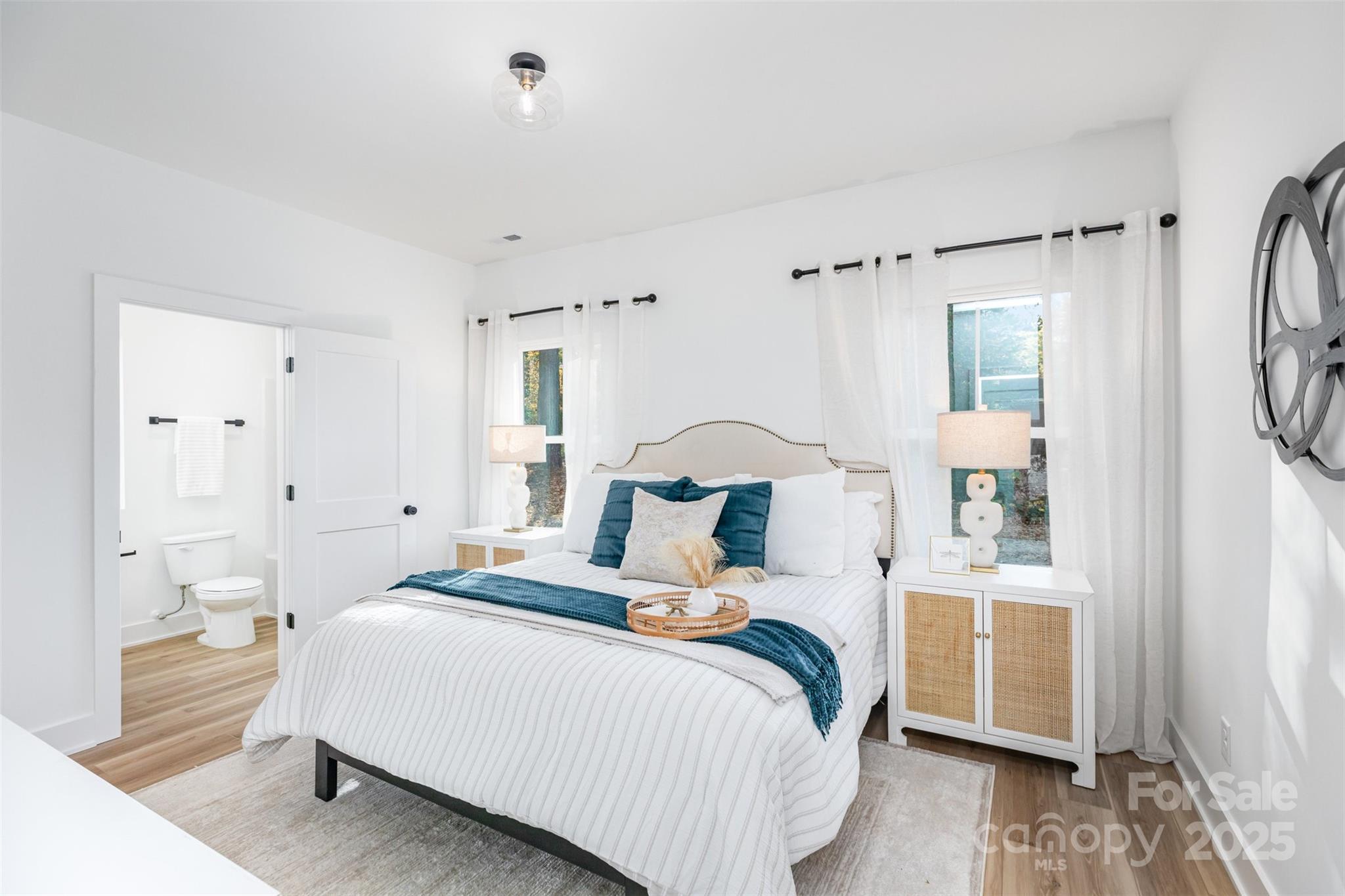 2802 Walkup Avenue Monroe, NC 28110 - Photo 9 of 16 a bedroom with a bed and a window