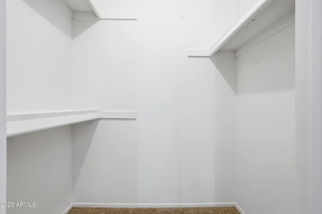 a view of small space with racks on the wall