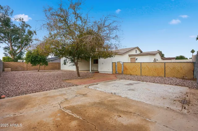 a house with trees in front of it