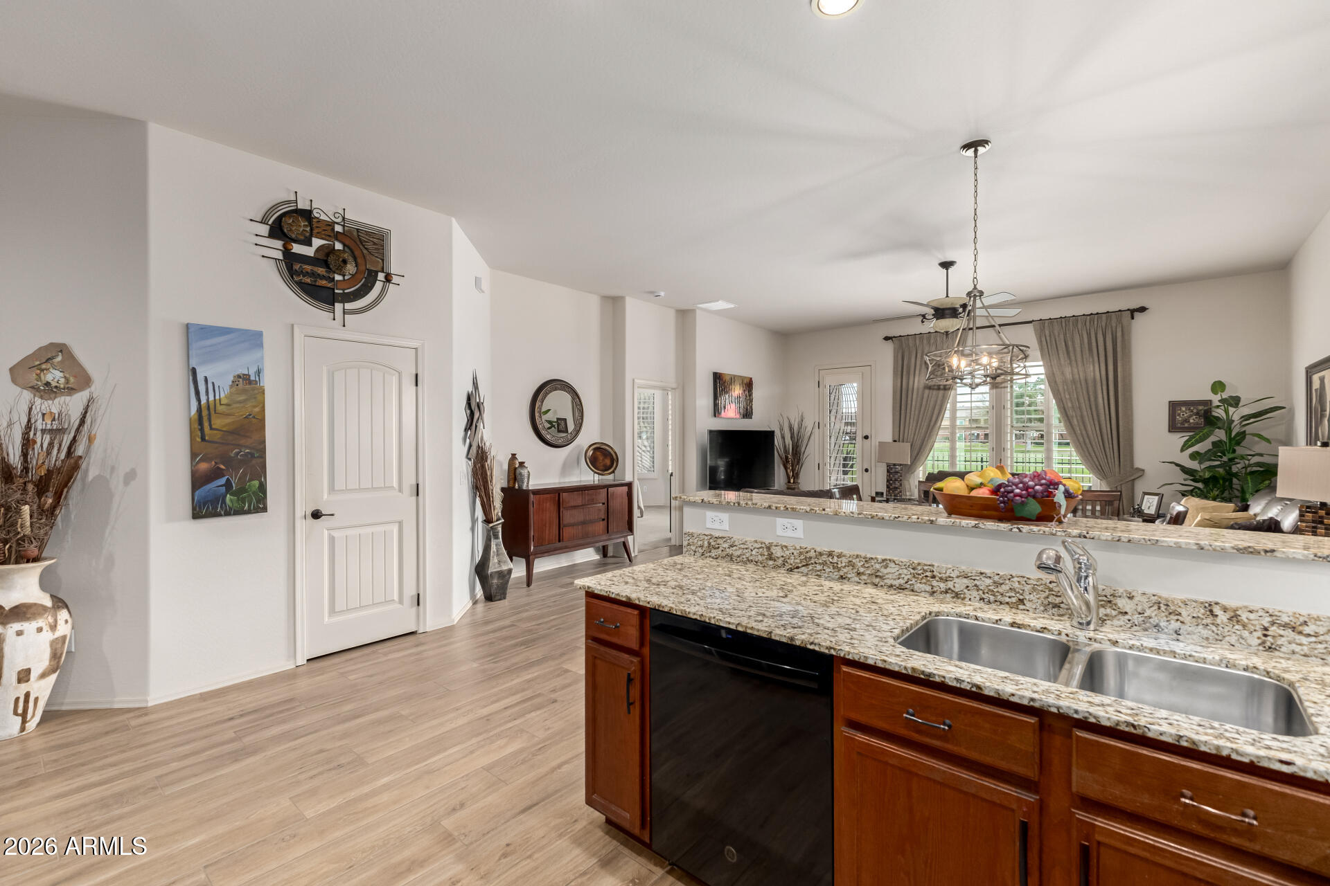 6202 East McKellips Road, Unit 277 Mesa, AZ 85215 - Photo 14 of 55 a kitchen with sink microwave and stove