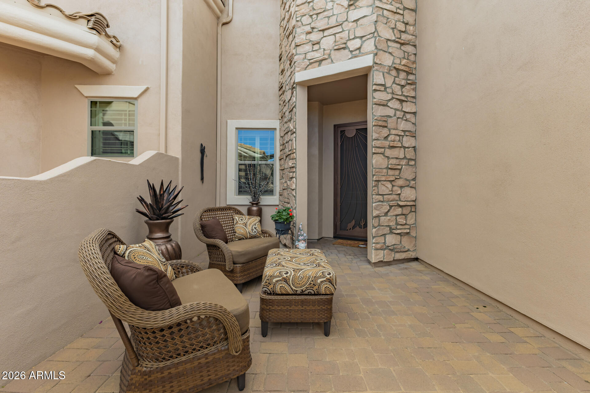 6202 East McKellips Road, Unit 277 Mesa, AZ 85215 - Photo 5 of 55 a living room with furniture and a potted plant