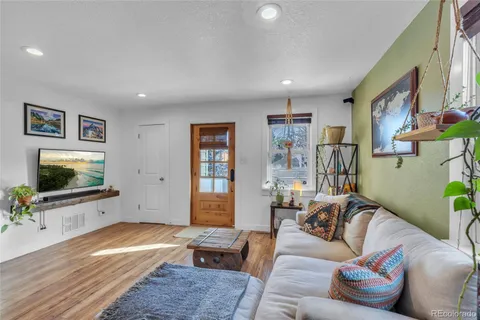 a bathroom with a sink vanity tub and a mirror