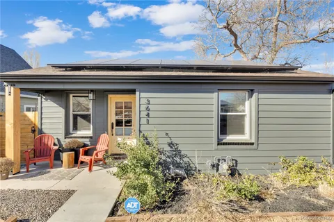 a kitchen with stainless steel appliances granite countertop a stove refrigerator sink and cabinets