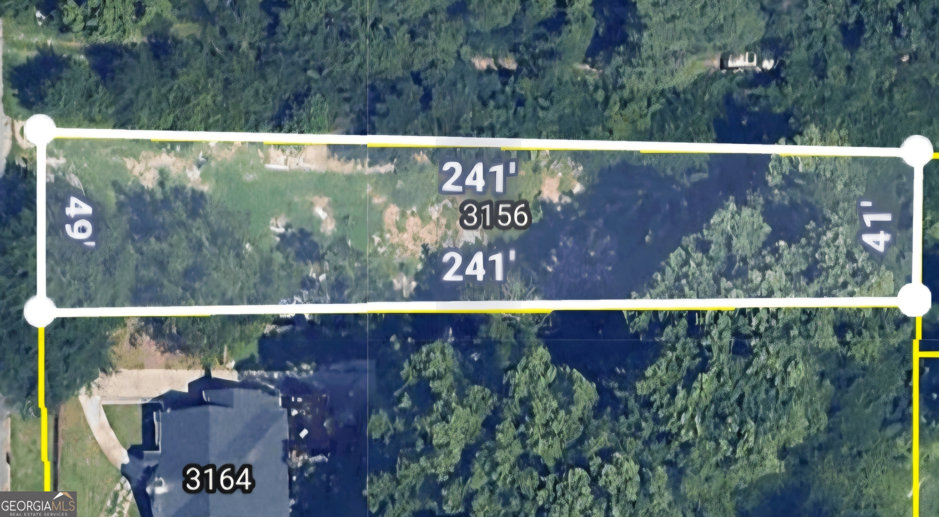 a view of swimming pool from a balcony