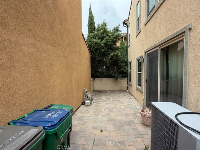 a backyard of a house with seating space