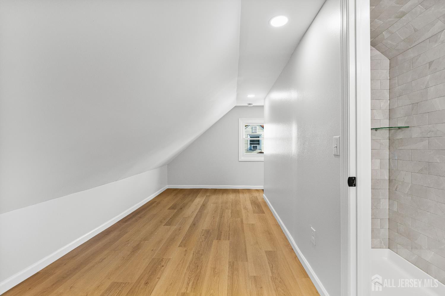 435 Warfield Road North Plainfield, NJ 07063 - Photo 21 of 35 a view of a hallway with wooden floor