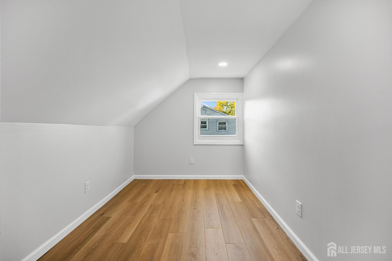 435 Warfield Road North Plainfield, NJ 07063 - Photo 25 of 35 a view of room with wooden floor and window