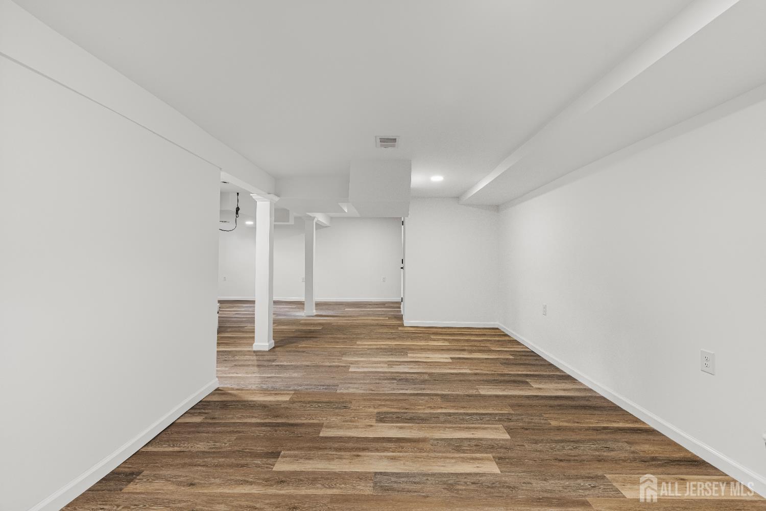 435 Warfield Road North Plainfield, NJ 07063 - Photo 29 of 35 a view of empty room with wooden floor