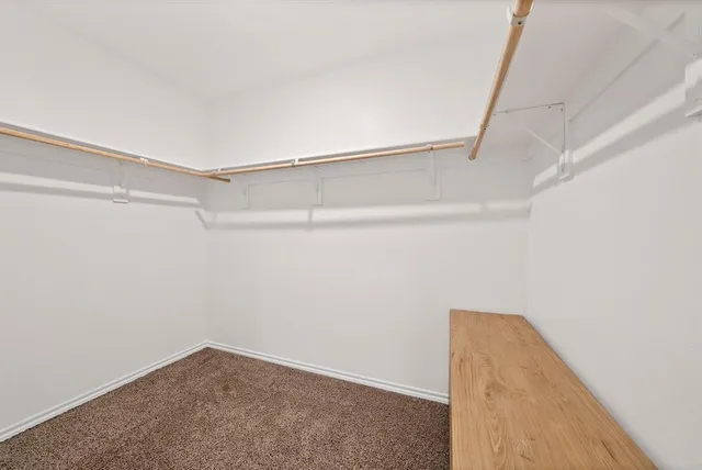 a view of a room with racks on the wall