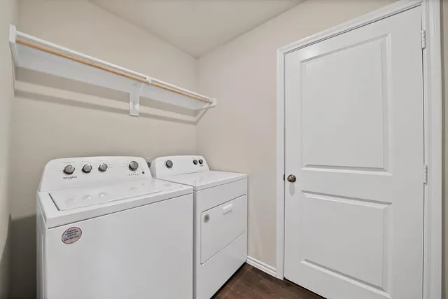a utility room with dryer and washer