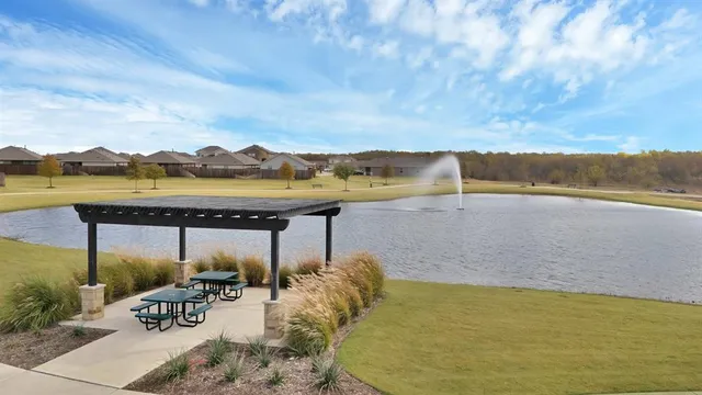 a view of a swimming pool with an ocean view