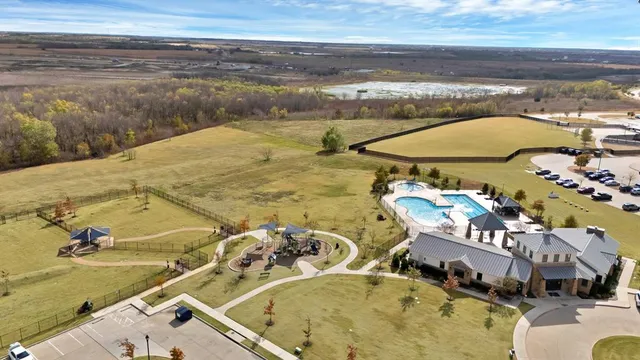 a view of a swimming pool with an ocean view