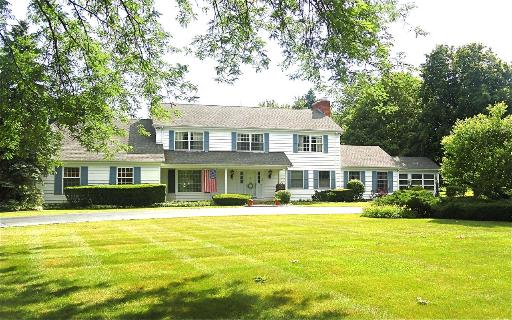 1751 Firth Road Inverness, IL 60067 - Photo 1 of 9 a front view of house with yard and trees
