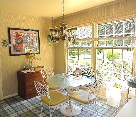 1751 Firth Road Inverness, IL 60067 - Photo 5 of 9 a view of a dining room with furniture a rug and wooden floor