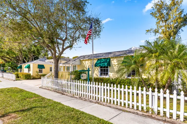 a view of a large body of water with a building in the background