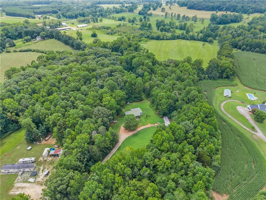 8285 Campground Road Clermont, GA 30527 - Photo 20 of 32 a view of a lake with a houses
