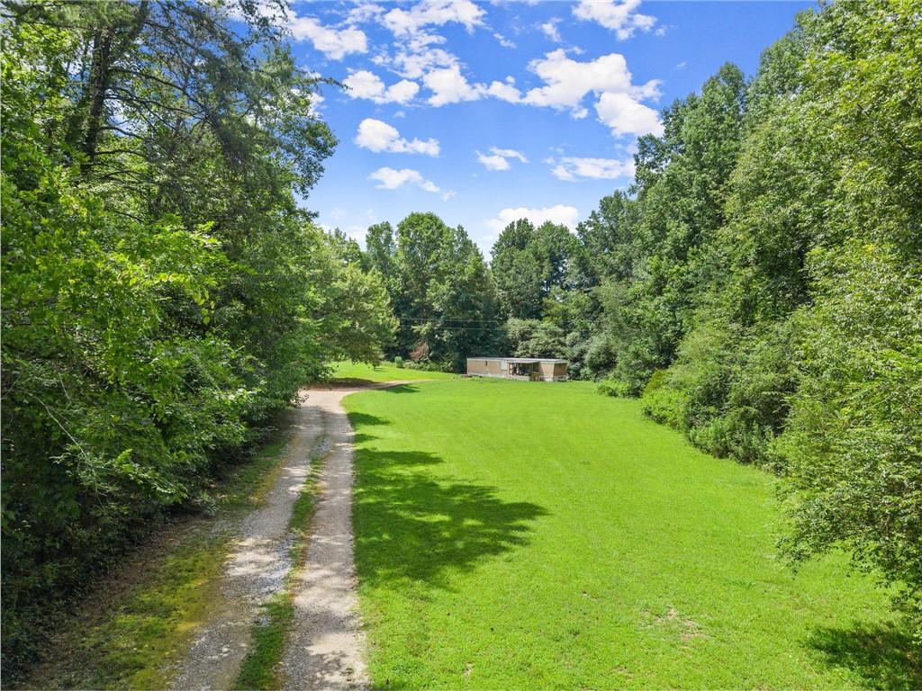 8285 Campground Road Clermont, GA 30527 - Photo 6 of 32 a view of a lake with a yard