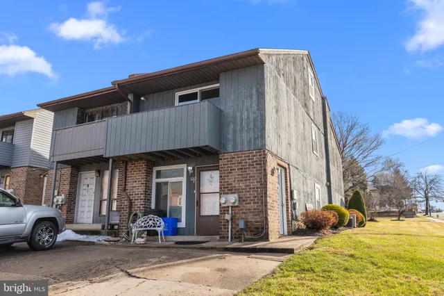 a front view of a house with patio