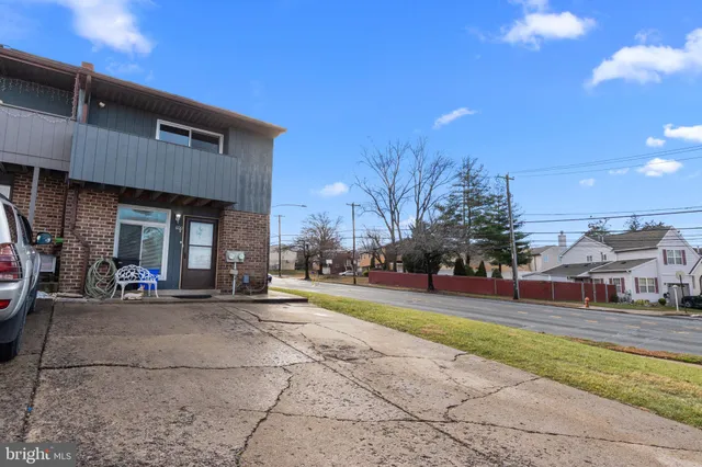 a view of a car park in front of building