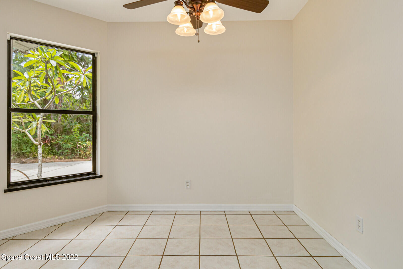 4650 Corey Road Grant Valkaria, FL 32950 - Photo 17 of 56 a view of an empty room with a window