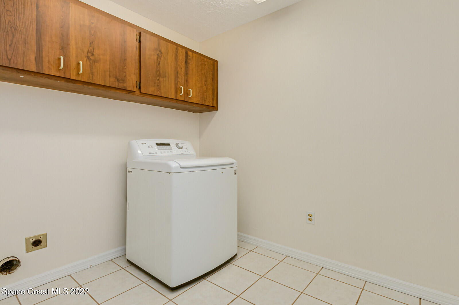 4650 Corey Road Grant Valkaria, FL 32950 - Photo 29 of 56 a utility room with dryer and washer