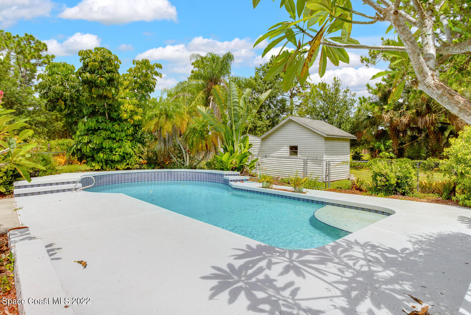 4650 Corey Road Grant Valkaria, FL 32950 - Photo 31 of 56 a house view with a swimming pool