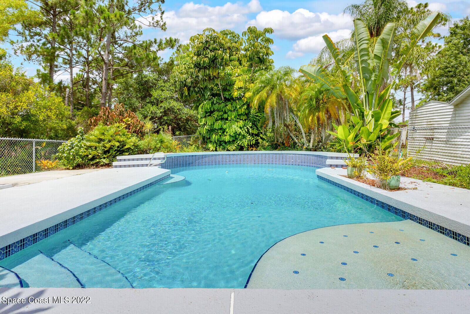 4650 Corey Road Grant Valkaria, FL 32950 - Photo 32 of 56 a view of a wooden floor