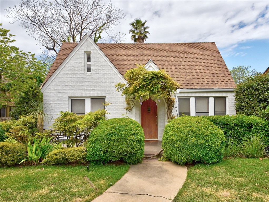 1506 Hartford Road Austin, TX 78703 - Photo 1 of 1 a front view of a house with garden