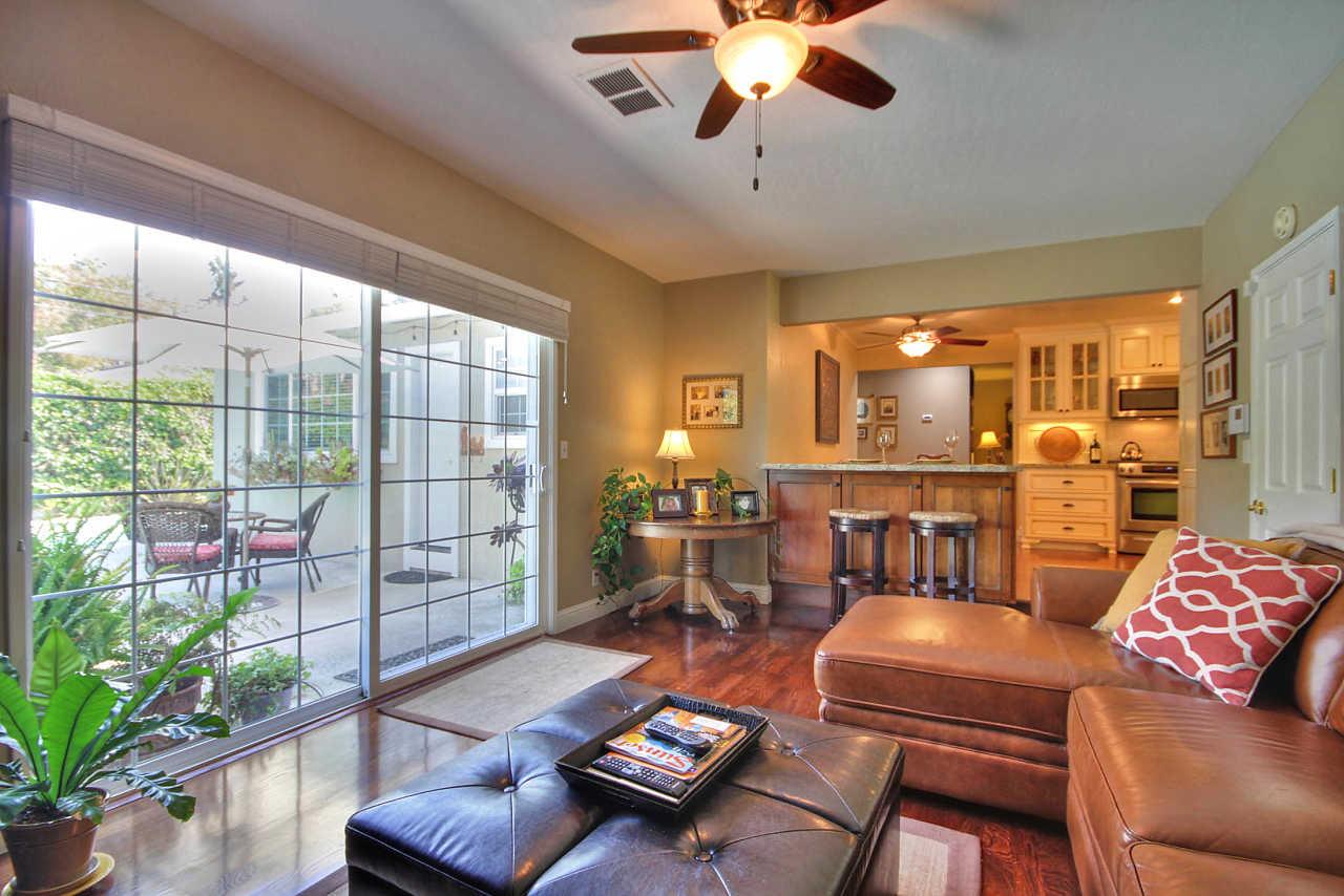 3953 Bucknall Road Campbell, CA 95008 - Photo 11 of 30 a living room with furniture and a floor to ceiling window