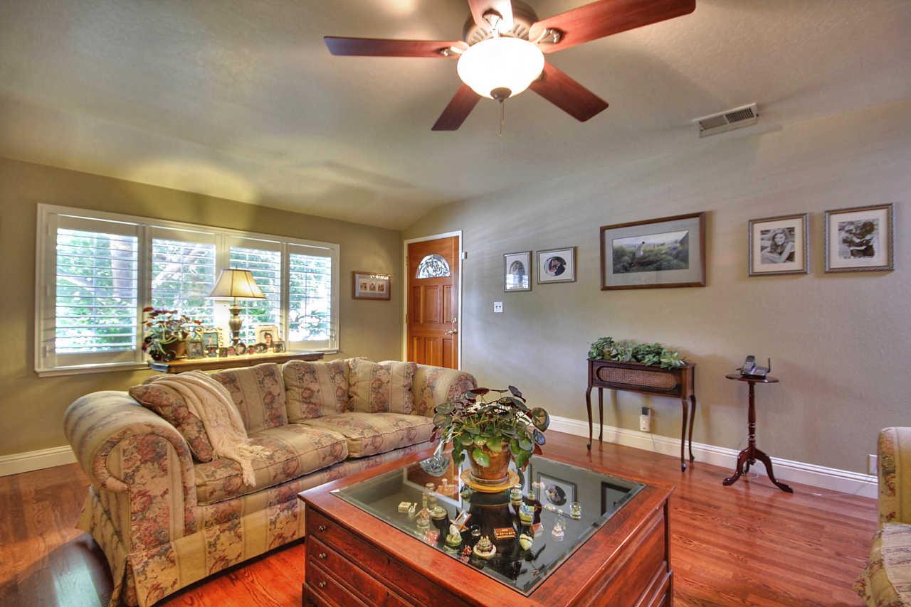 3953 Bucknall Road Campbell, CA 95008 - Photo 16 of 30 a living room with furniture and a large window