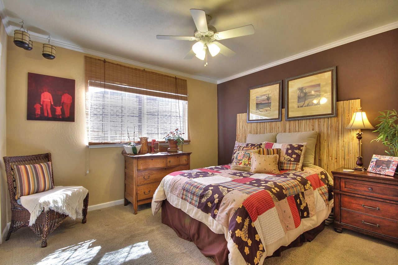 3953 Bucknall Road Campbell, CA 95008 - Photo 20 of 30 a bedroom with a bed and wooden floor