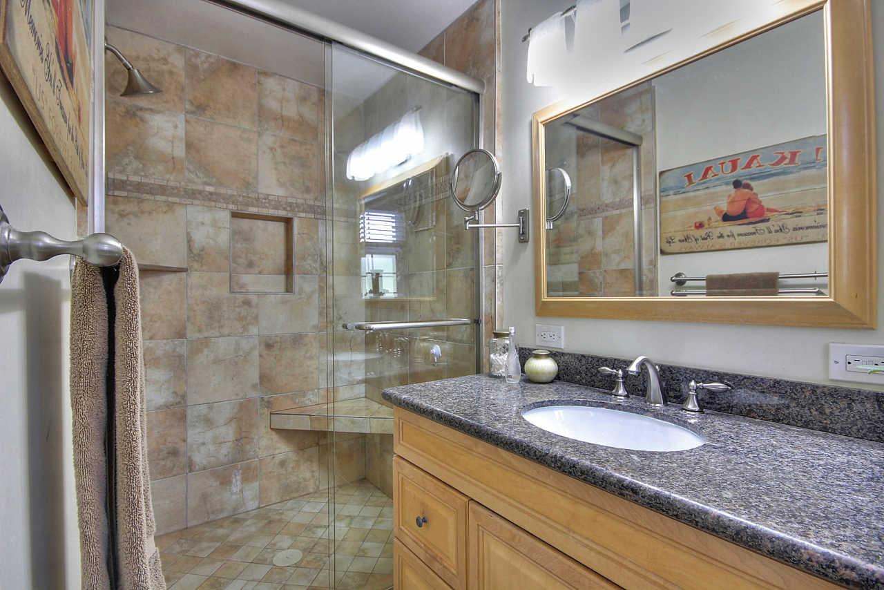 3953 Bucknall Road Campbell, CA 95008 - Photo 24 of 30 a bathroom with a granite countertop sink mirror and shower