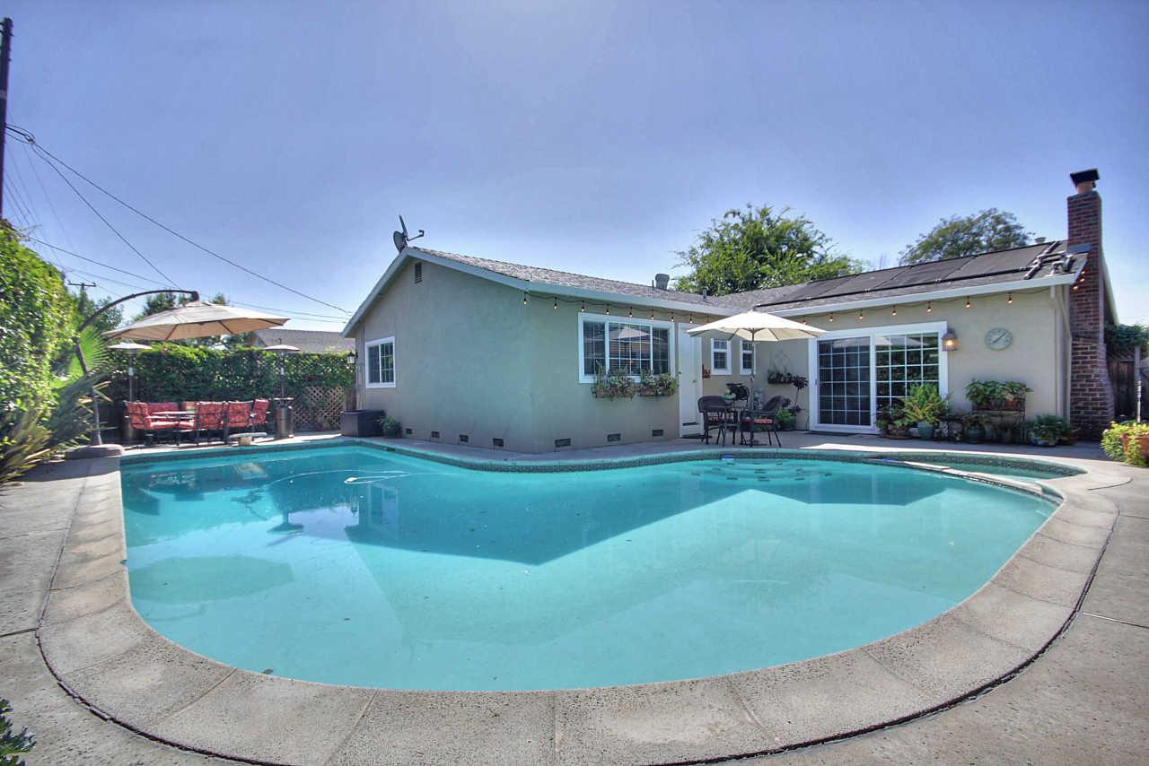 3953 Bucknall Road Campbell, CA 95008 - Photo 25 of 30 a view of a house with a backyard porch and sitting area
