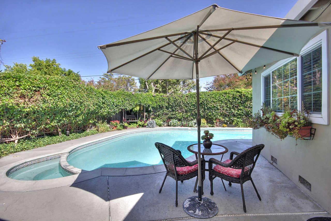 3953 Bucknall Road Campbell, CA 95008 - Photo 27 of 30 a patio with a patio table and chairs