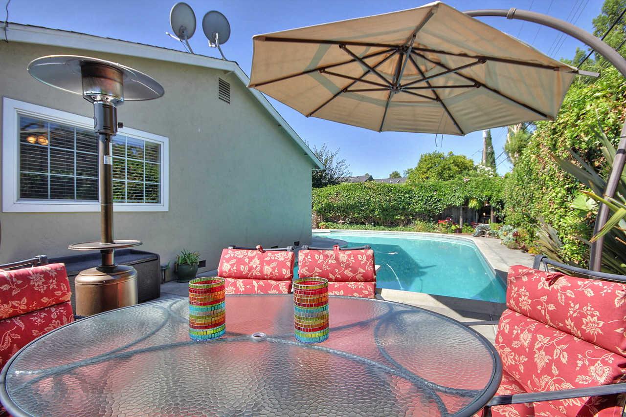 3953 Bucknall Road Campbell, CA 95008 - Photo 28 of 30 a patio with a patio table and chairs