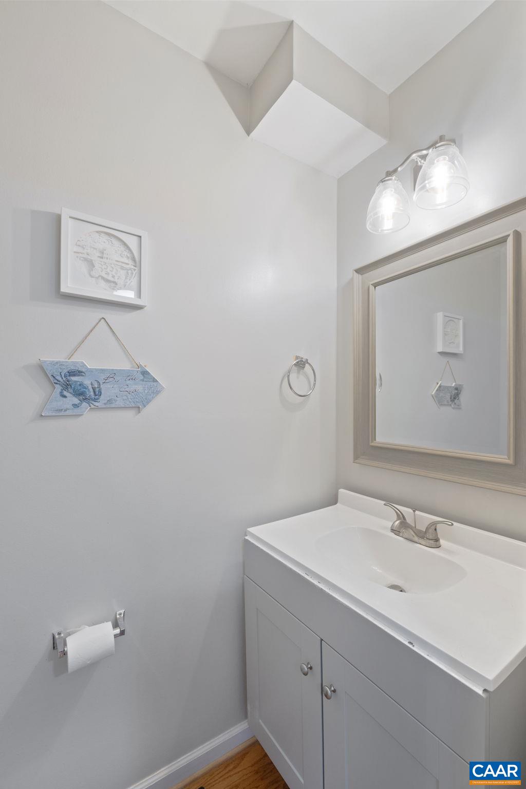 89 Riverside Drive Palmyra, VA 22963 - Photo 16 of 47 a bathroom with a sink mirror and vanity
