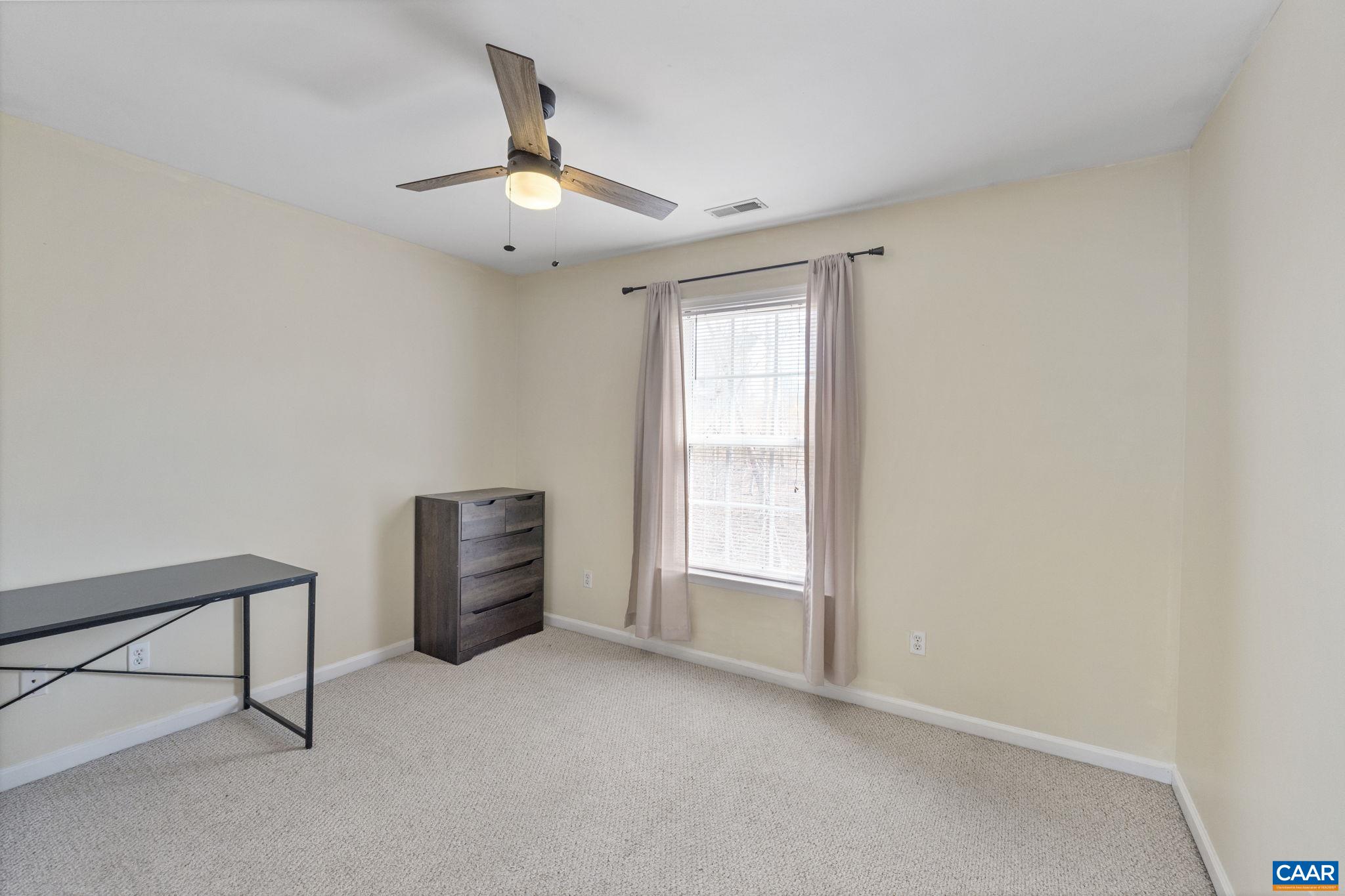 89 Riverside Drive Palmyra, VA 22963 - Photo 18 of 38 an empty room with windows and cabinet