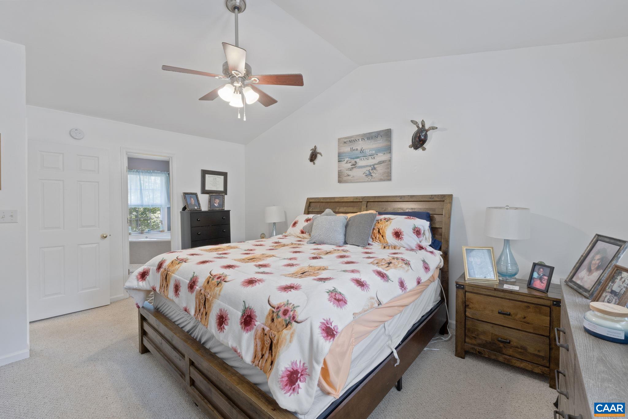 89 Riverside Drive Palmyra, VA 22963 - Photo 18 of 47 a bedroom with a bed and window