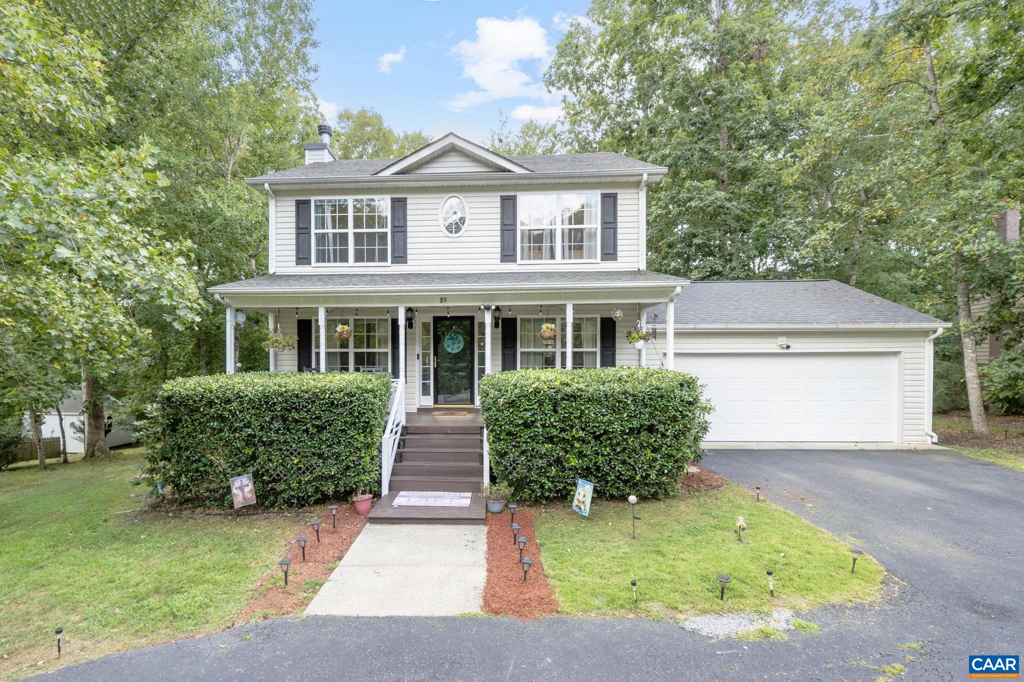 89 Riverside Drive Palmyra, VA 22963 - Photo 30 of 38 front view of a house with a yard